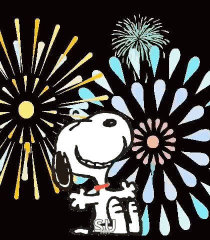 Snoopy Is Standing In Front Of A Fireworks Display And Holding A Sign That Says `` Happy New Year '' . GIF