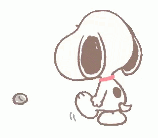 Snoopy Is Standing Next To A Rock And Looking At It . GIF