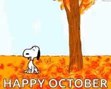 Snoopy Is Standing Next To A Tree In A Field Of Leaves And Says `` Happy October '' . GIF