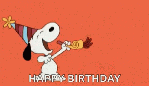 Snoopy Is Wearing A Party Hat And Blowing A Party Horn While Saying Happy Birthday . GIF