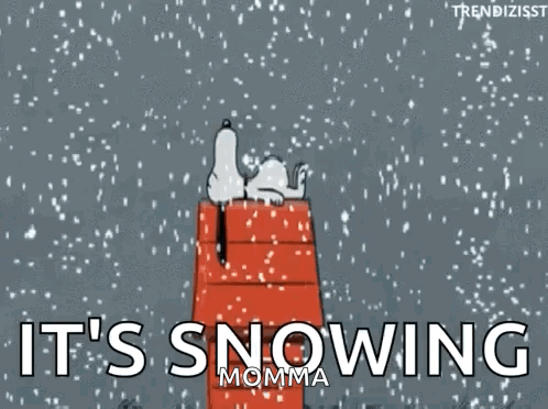 Snoopy Lying on Sleigh in Snow