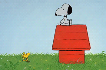 Snoopy Walking to Red Doghouse