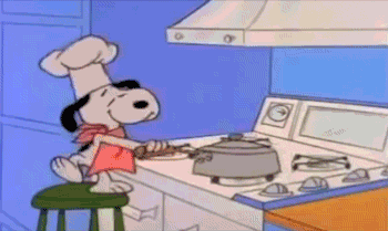 Snoopy Wearing Chef's Hat Cooking in Kitchen