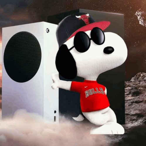 Snoopy Wearing Sunglasses And A Bulls Shirt Stands In Front Of An Xbox Box GIF