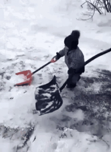 Little Kid Plowing On Snow Day GIF
