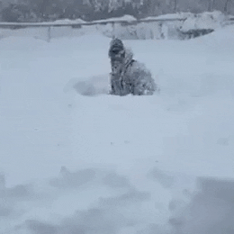 Half Body Buried In Snow Storm GIF