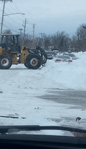 Snow Storm Aftermath Machineries Plowing Cars GIF