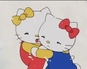 Hello Kitty Cuddling In Snow Storm GIF