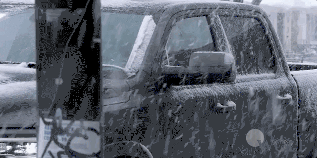 Dick Wolf Walking In Snow Storm GIF