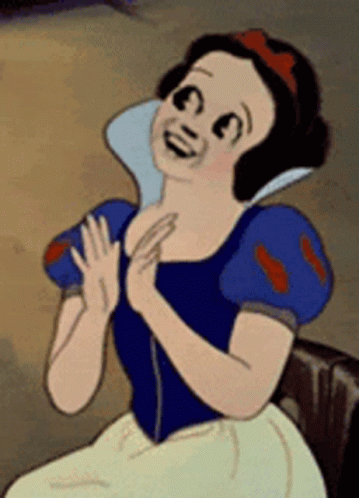 Snow White Smiling With Hands Folded