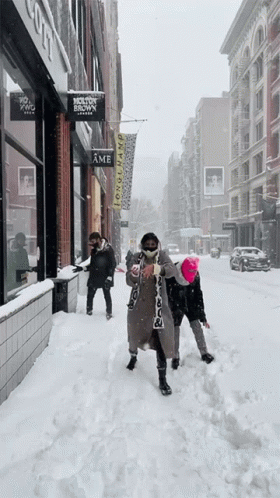 Girl Throwing Snowball Fight GIF