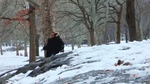 Men Exchanging Snowball Fight GIF