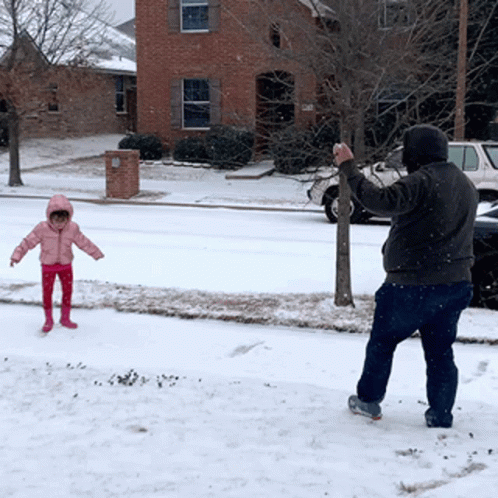 Snowball Fight Dad And Daughter GIF