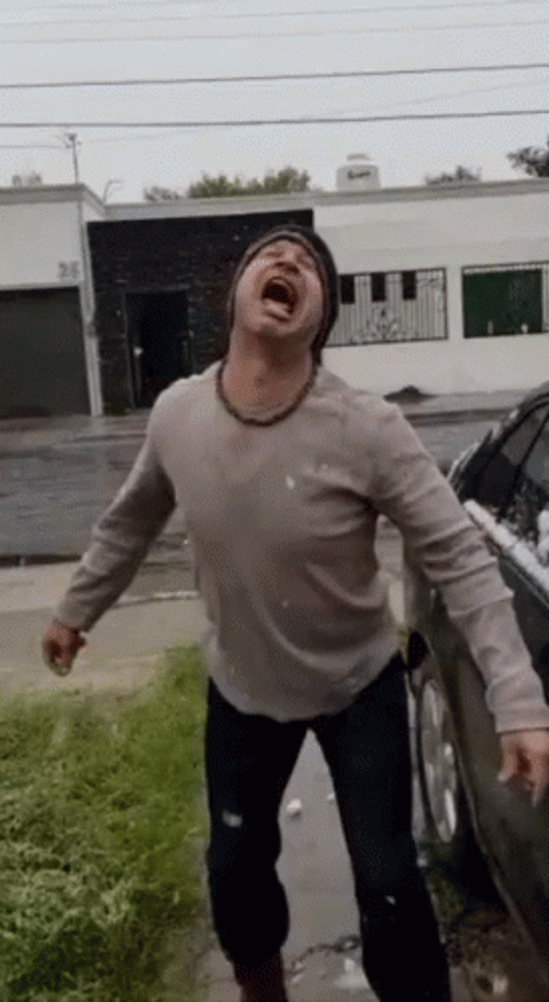 Snowball Fight Hit The Man's Face GIF