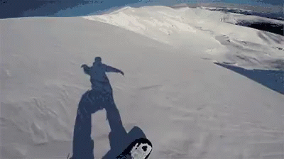 Snowboarder Shadow On Snowy Mountain GIF