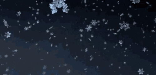 Snowflake Flying In The Dark GIF