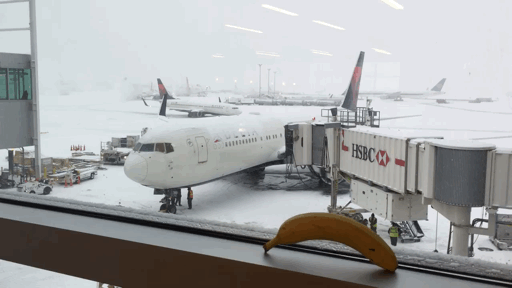 Snowing At Airport Terminal GIF