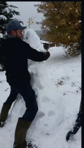 Guy Destroy The Snowman GIF