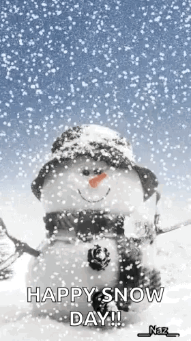 Snowman Wearing Hat and Scarf in Falling Snow