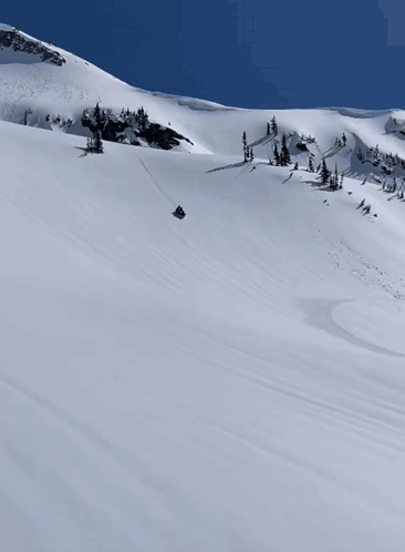 Snowmobile Going Down Snowy Hill GIF