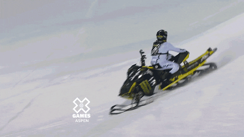 Snowmobile With A Rider Crashing GIF