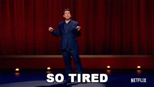 So Tired Michael Mcintyre Standing While Talking GIF