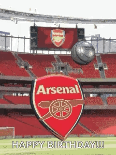 Soccer Ball Flying in Front of Arsenal Logo
