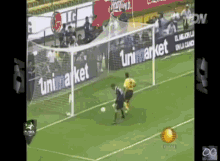 Soccer Game in Front of Banner