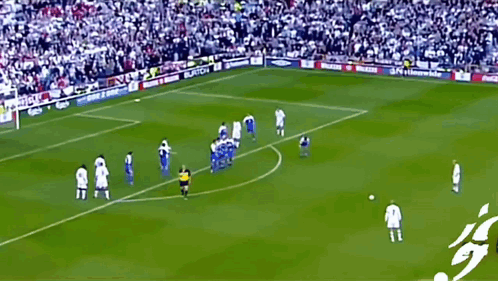 Soccer Game in Front of Crowd With Samsung Sign