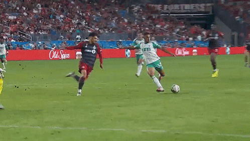 Soccer Game In Front Of Old Spice Ad GIF