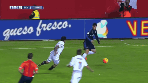 Soccer Game In Front Of Queso Fresco Sign GIF