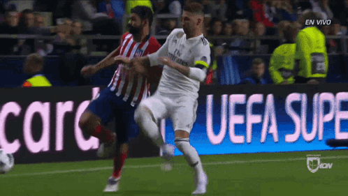 Soccer Game In Front Of UEFA Super Banner GIF