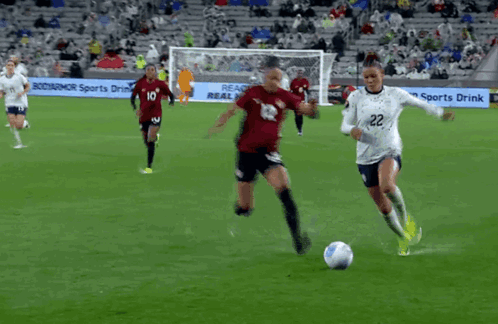 Soccer Game in Stadium With Ford Sign