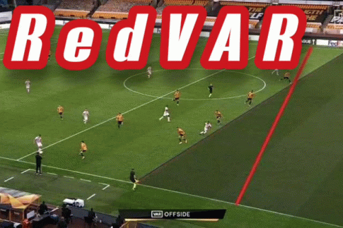 Soccer Game in Stadium With Offside Sign