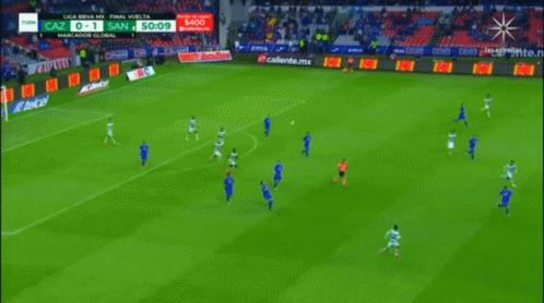 Soccer Game in Stadium with Telcel Ads
