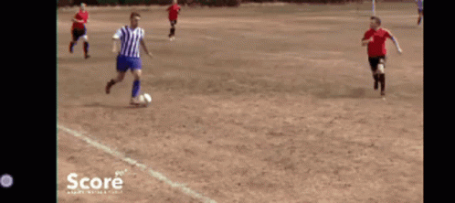 Soccer Game on Field Saying Score