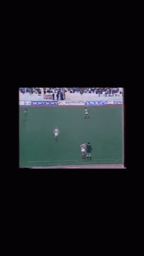 Soccer Game on Field with Adidas Express Ad
