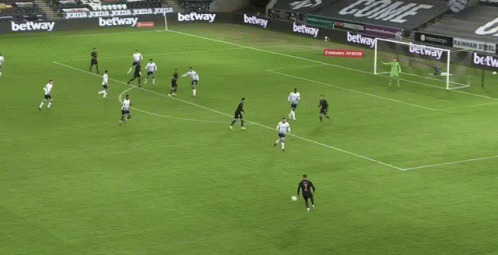 Soccer Game on Field with Betting Advertisements