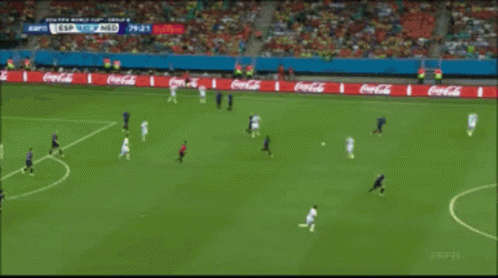 Soccer Game on Field With Fly Emirates Advertisements