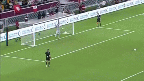 Soccer Game on Field with Qatar Airways Ads