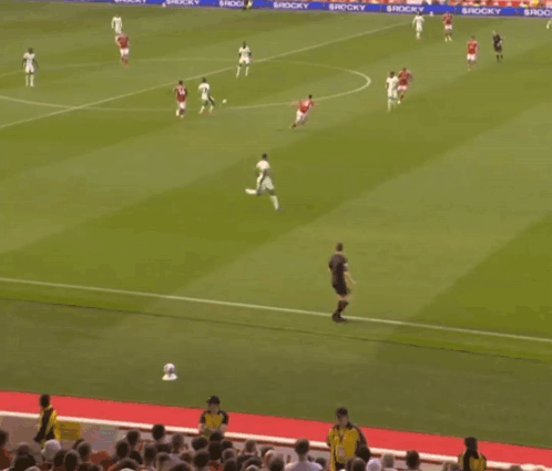 Soccer Game on Field With Rocky Advertisements