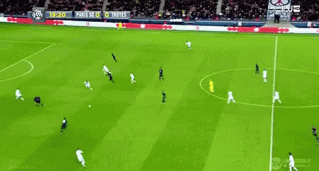 Soccer Game on Green Field
