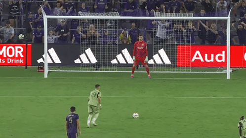 Soccer Goalie Diving for Ball in Front of Audi Ad