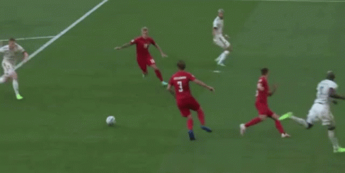 Soccer Goalie Diving to Block Shot