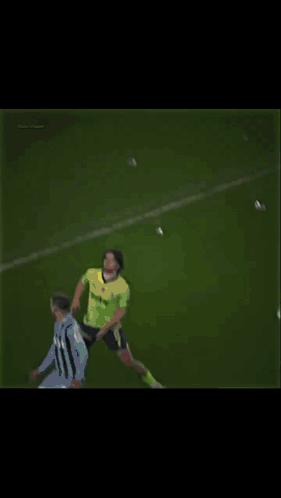Soccer Goalie Leaping for Ball Under Real Banner