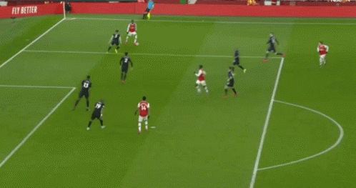 Soccer Goalie Lying On Ground In Front Of Water Sign GIF