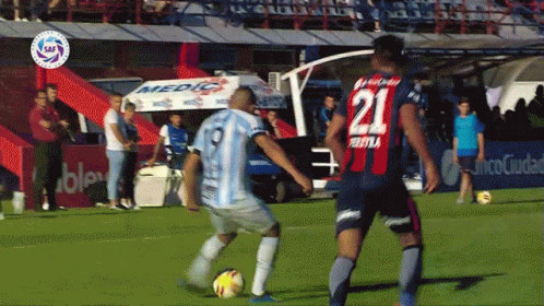Soccer Player 21 Kicks Ball
