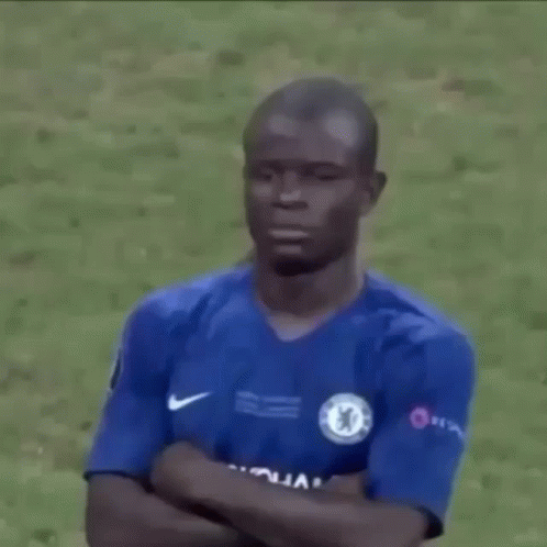 Soccer Player Arms Crossed On Field