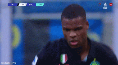 Soccer Player at Scoreboard int 1-0 bol