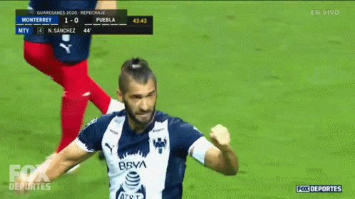 Soccer Player Celebrates Goal Against Puebla